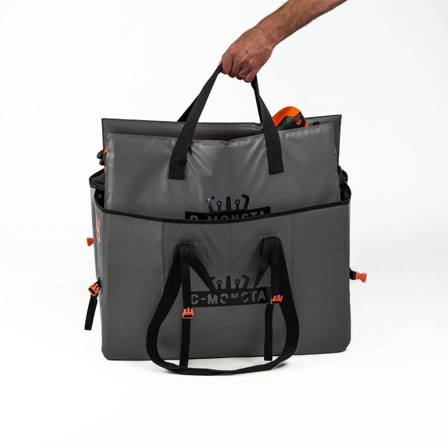 C-Monsta split bag – both compartments open side by side showing wet and dry storage separation